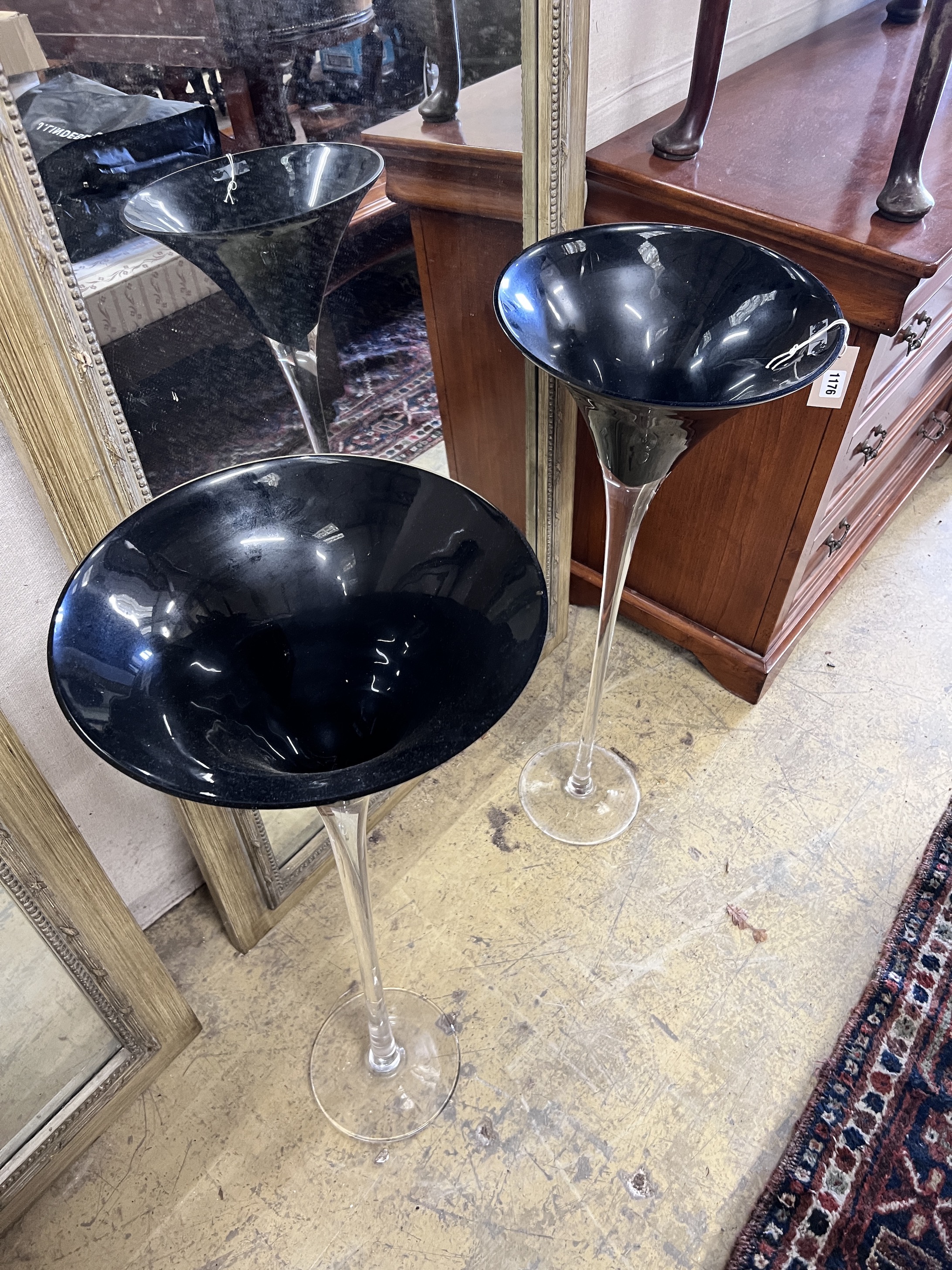 A pair of large clear and black glass vases, height 90cm